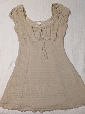 No Comment Cream Smocked Mini Dress with Tie Neck